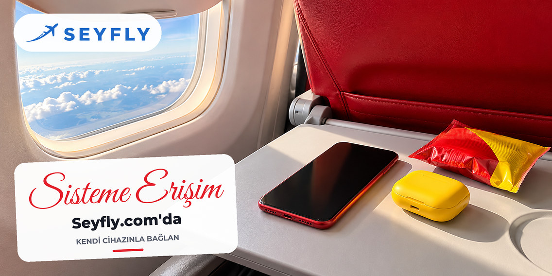Kabin tepsisinde akıllı telefon, kulaklık kutusu ve atıştırmalık
