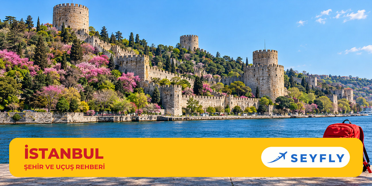 Erguvan ağaçları arasında Boğaz kıyısındaki Rumeli Hisarı