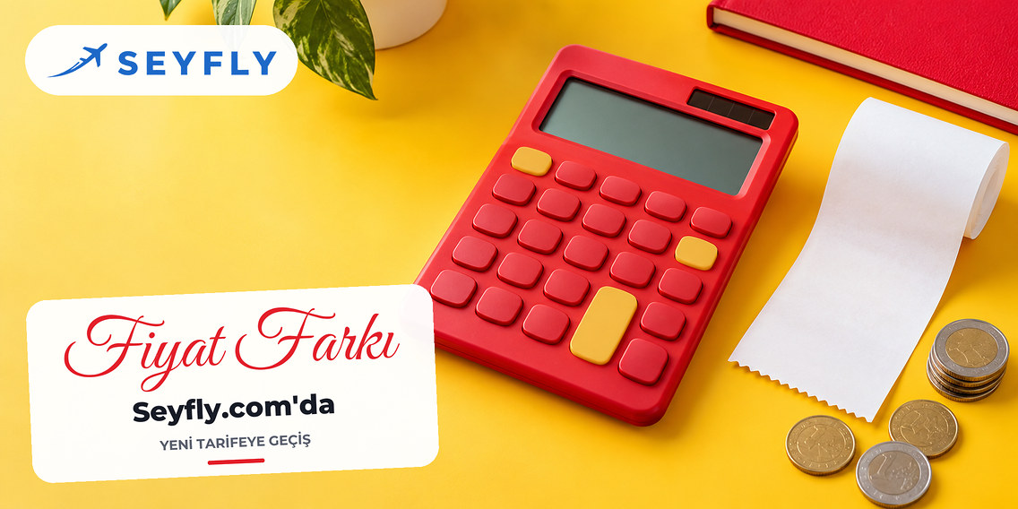 Ekranı boş hesap makinesi yanında boş fiş ve madeni paralar