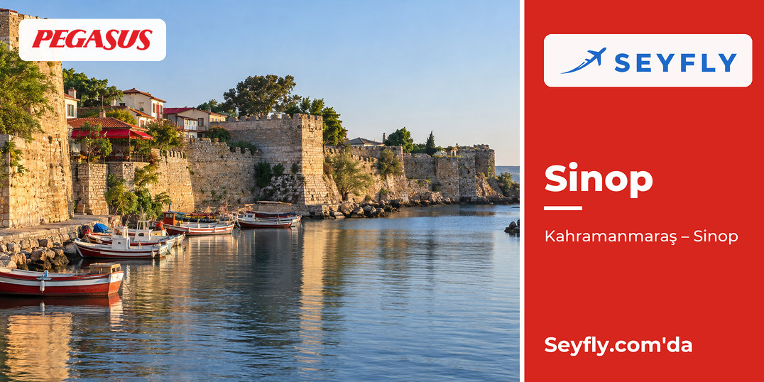 Sinop limanı kıyısında uzanan eski kale surları ve sakin deniz