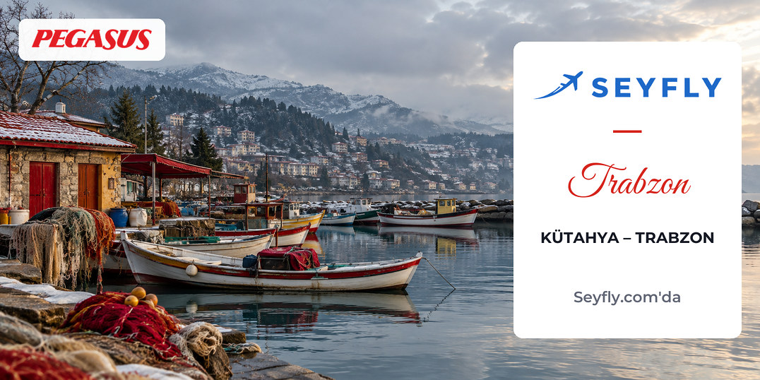 Kış sabahı Trabzon kıyısında küçük balıkçı barınağı ve tekneler